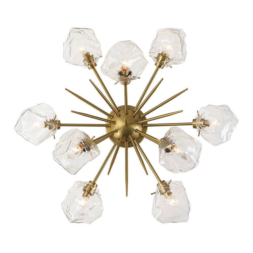 Introducing our 9-Light Modern Glam Ice Glass Semi Flush Mount Ceiling Light, designed to transform your dining room, kitchen, or living room into a space of unmatched elegance. This fixture boasts a metal hemisphere, expertly crafted with nine lamp arms and ornate stems, culminating in a captivating sunburst silhouette.